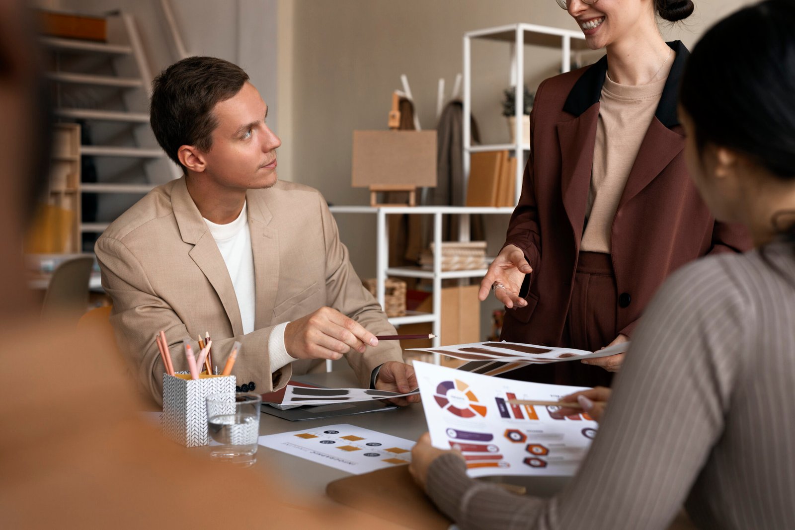 side view colleagues working as team